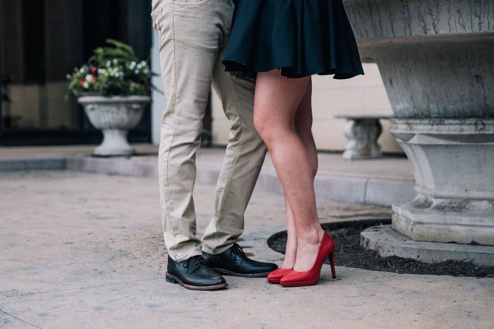 A date: red heels on tiptoe