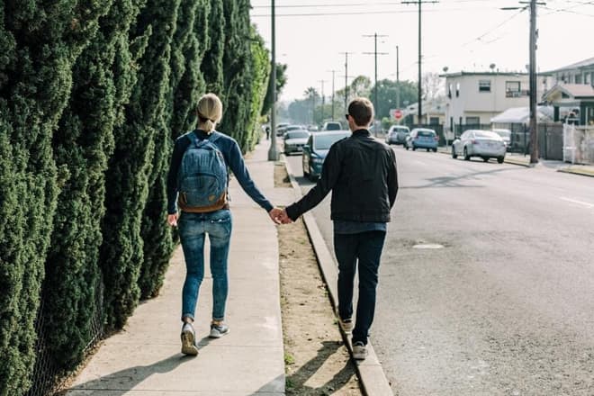 Walking hand in hand down the street